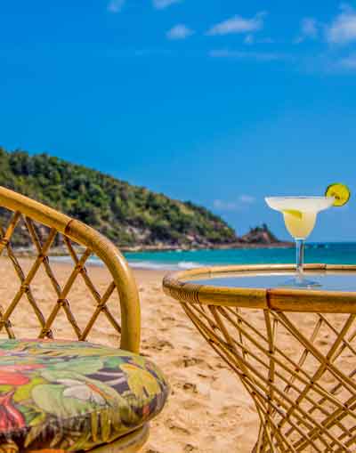 Relaxing with a cocktail on the beach